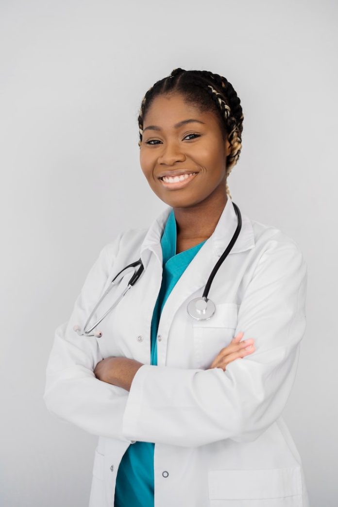 medium-shot-smiley-doctor-with-coat_23-2148814212